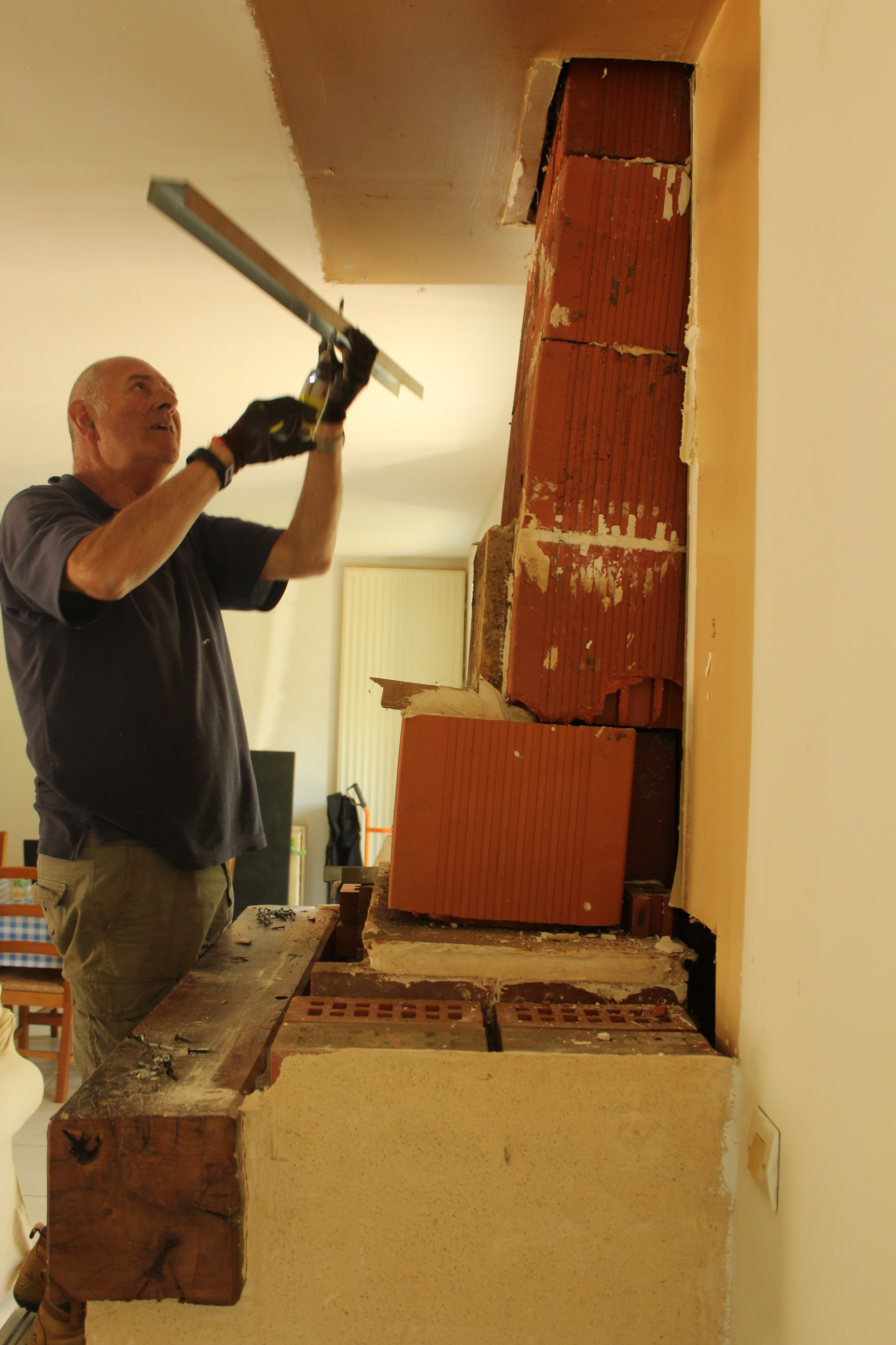 Dismantling the old chimney